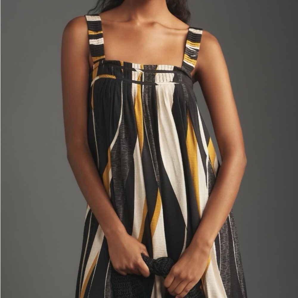 Anthropologie Black and Gold midi dress